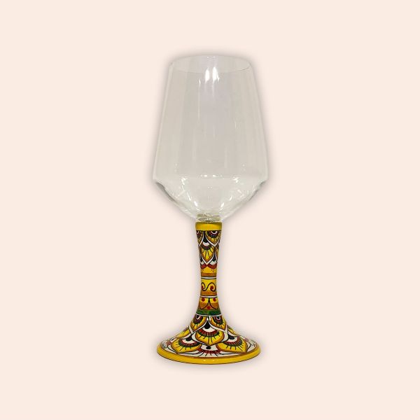 ELEGANT LEAD-FREE  CRYSTAL GLASS WITH CERAMIC STEM.  DESIGN: PEACOCK'S TAIL IN RED AND YELLOW cm.23h